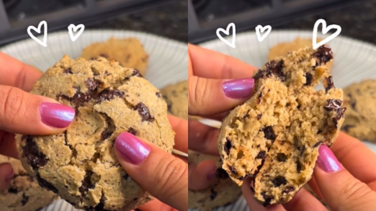 Cookie partido ao meio, mostrando o miolo macio e as gotas de chocolate derretidas